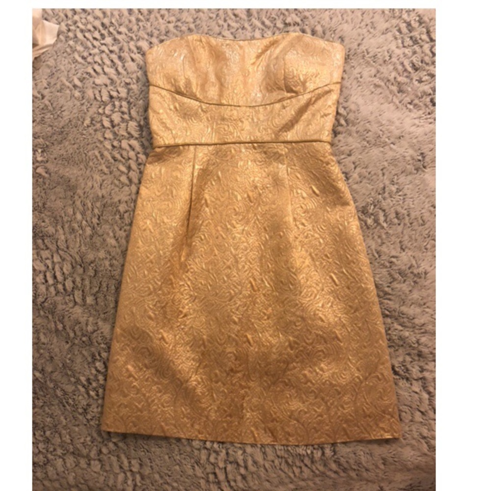Gold, textured, strapless dress